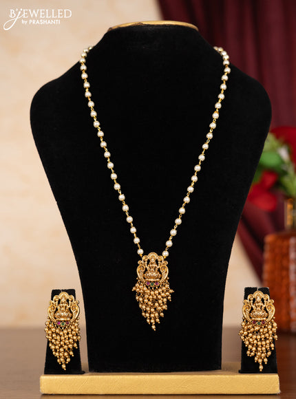 Pearl necklace lakshmi pendant with kemp stones and golden beads hangings