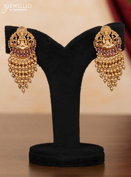 Pearl necklace lakshmi pendant with ruby stones and golden beads hangings