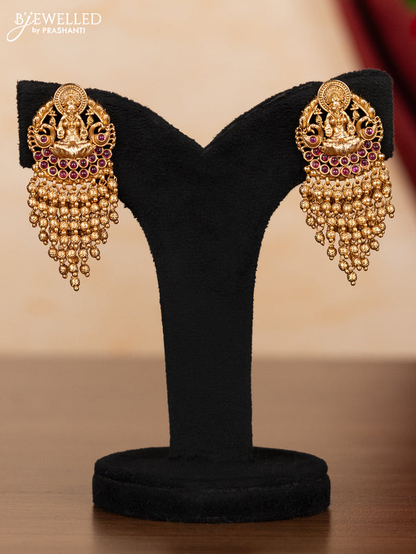Pearl necklace lakshmi pendant with ruby stones and golden beads hangings
