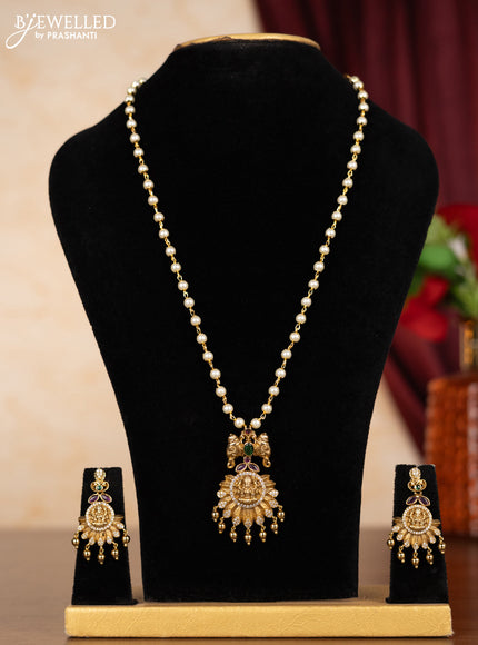 Pearl necklace lakshmi pendant with kemp & cz stones and golden beads hangings
