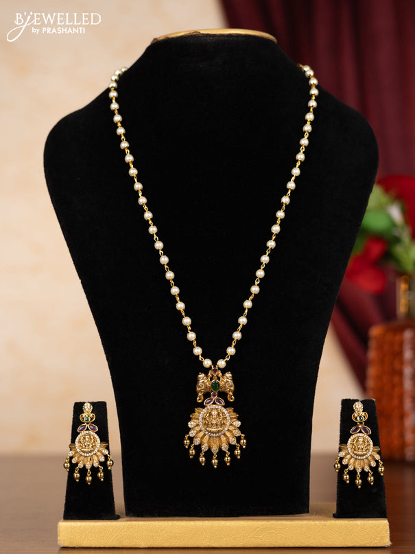 Pearl necklace lakshmi pendant with kemp & cz stones and golden beads hangings
