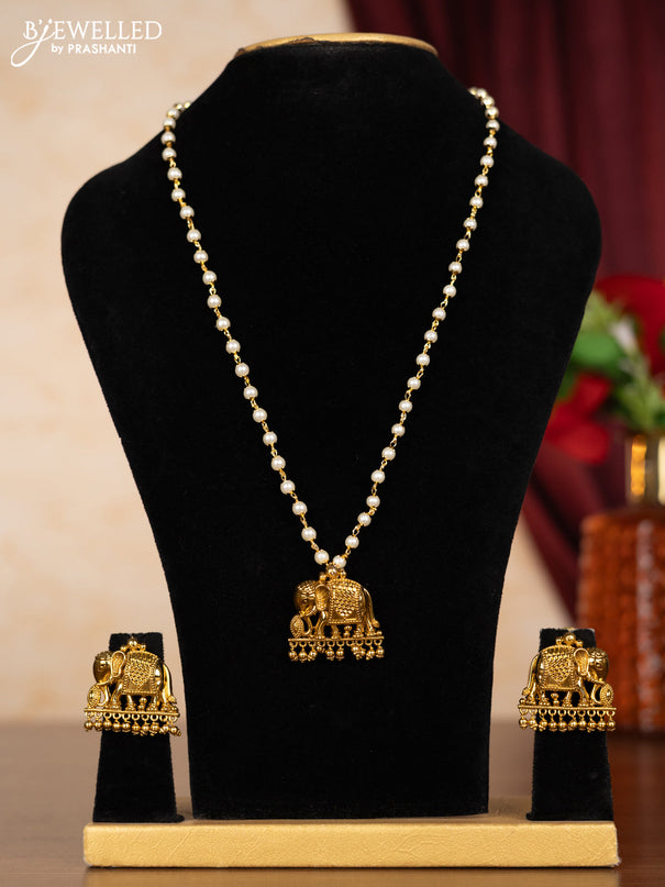 Pearl necklace with elephant pendant and golden beads hangings