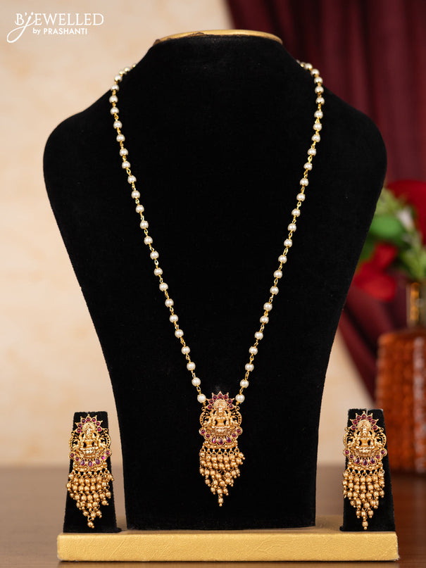 Pearl necklace lakshmi pendant with ruby stones and golden beads hangings
