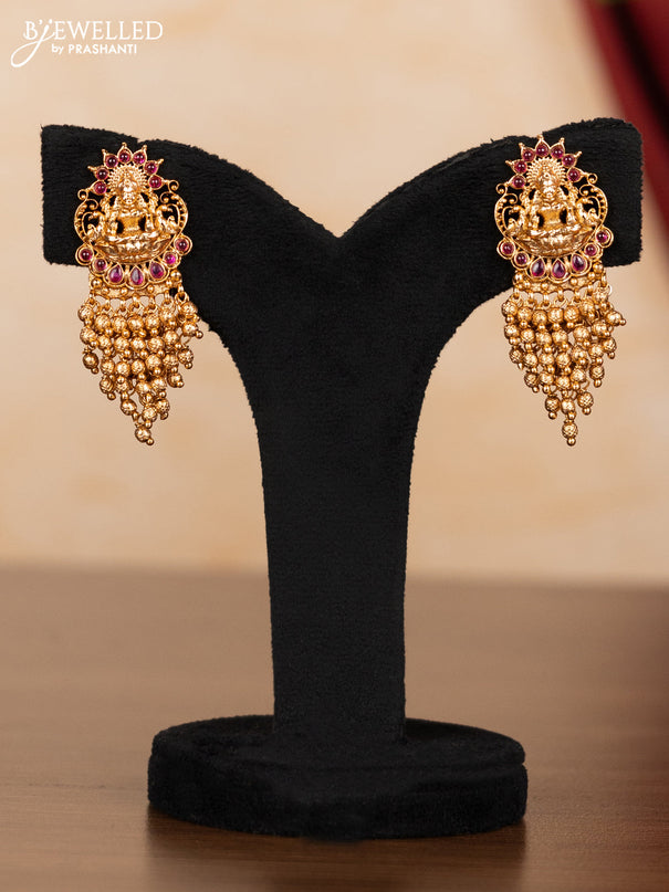 Pearl necklace lakshmi pendant with ruby stones and golden beads hangings
