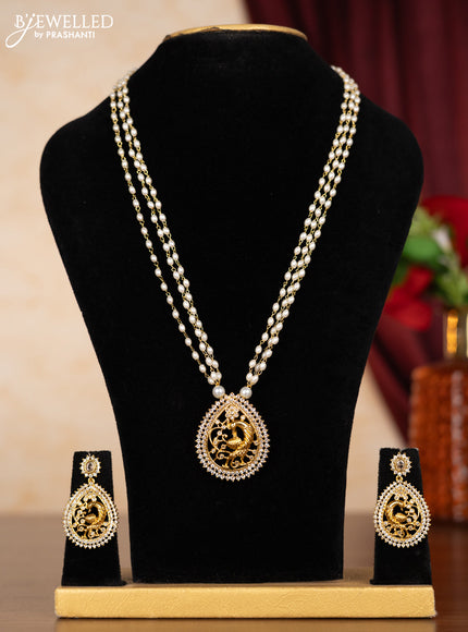 Pearl triple layer necklace with peacock design and cz stones