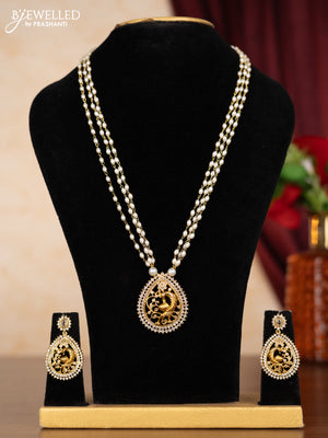 Pearl triple layer necklace with peacock design and cz stones
