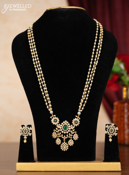 Pearl triple layer necklace with emerald & cz stones and hangings