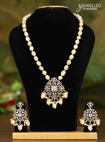 Beaded yellow necklace with floral pendant in victorian finish