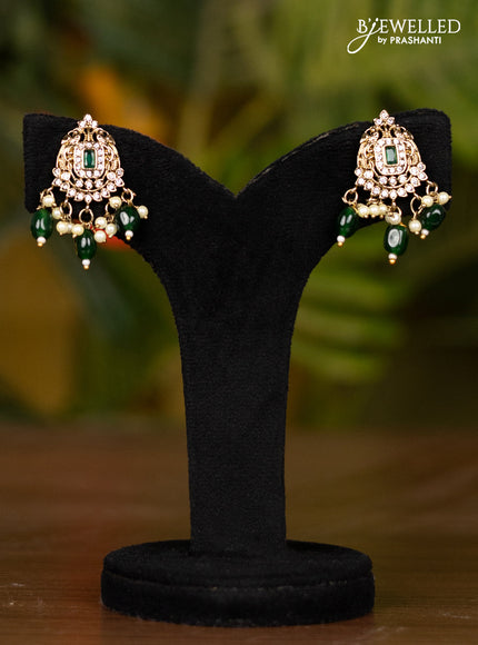 Beaded dark green necklace with double peacock pendant in victorian finish