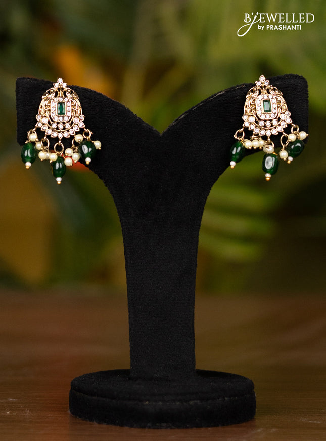 Beaded dark green necklace with double peacock pendant in victorian finish