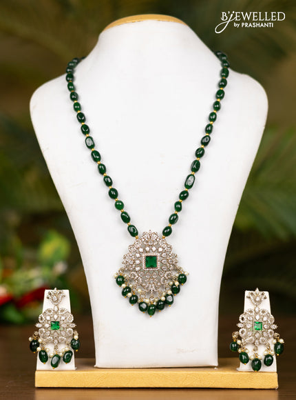 Beaded dark green necklace with floral pendant in victorian finish