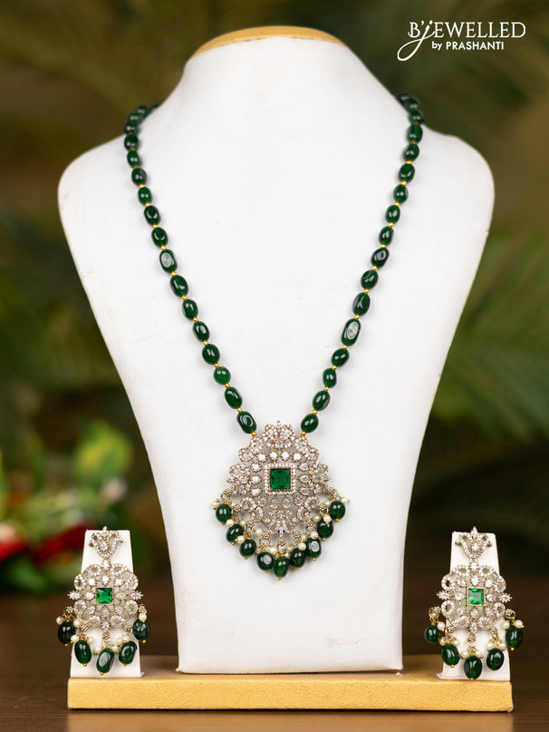 Beaded dark green necklace with floral pendant in victorian finish
