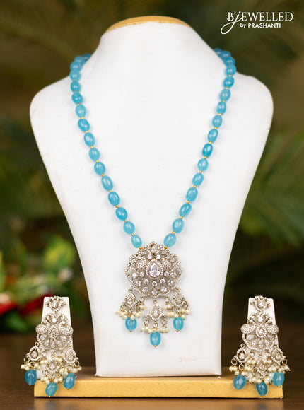 Beaded blue necklace with double peacock pendant in victorian finish