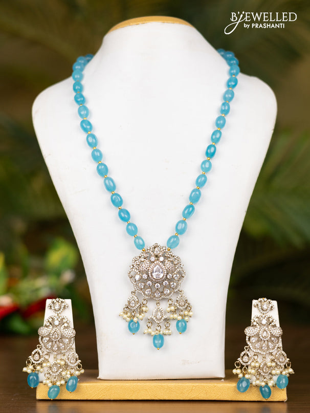 Beaded blue necklace with double peacock pendant in victorian finish