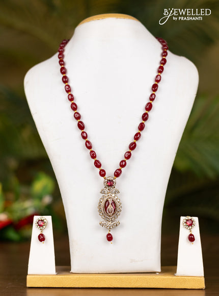 Beaded maroon necklace with double peacock pendant in victorian finish