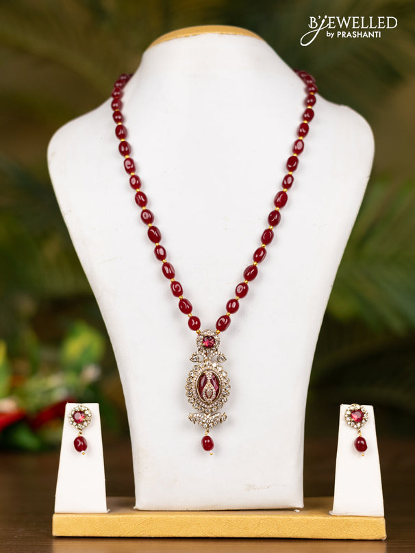 Beaded maroon necklace with double peacock pendant in victorian finish