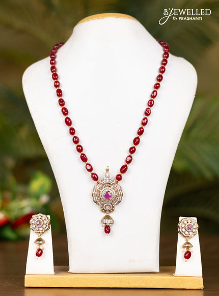 Beaded maroon necklace with floral pendant in victorian finish