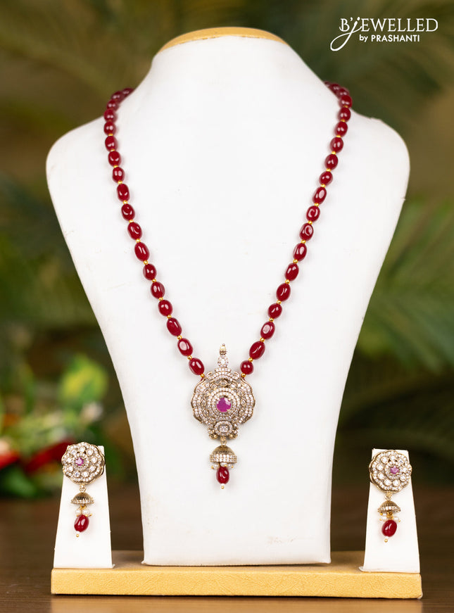 Beaded maroon necklace with floral pendant in victorian finish