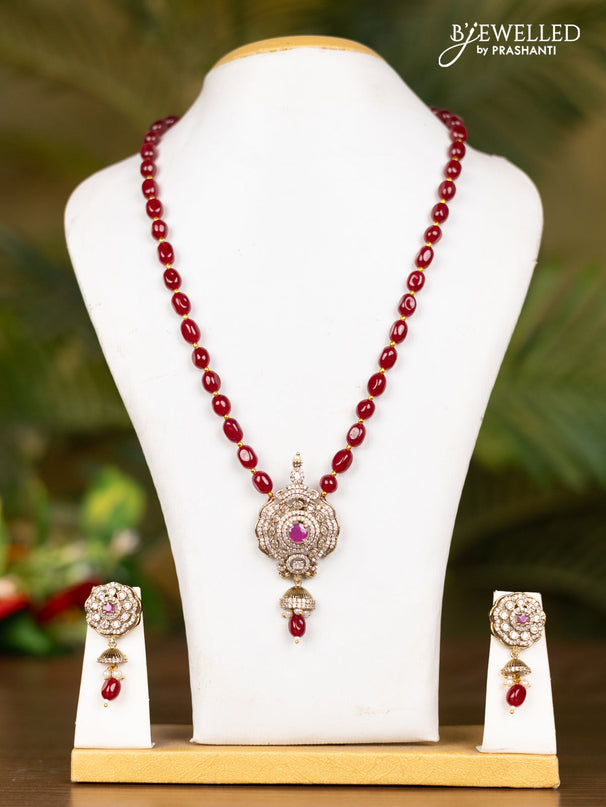 Beaded maroon necklace with floral pendant in victorian finish