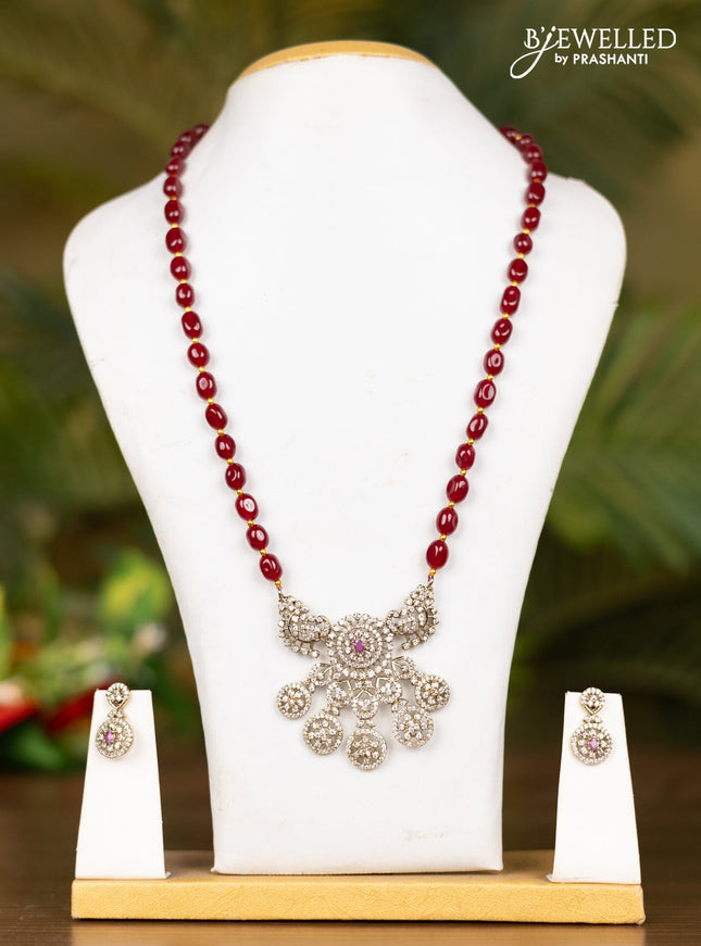 Beaded maroon necklace with floral pendant in victorian finish