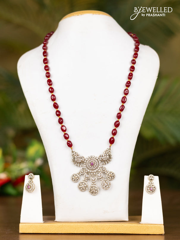 Beaded maroon necklace with floral pendant in victorian finish