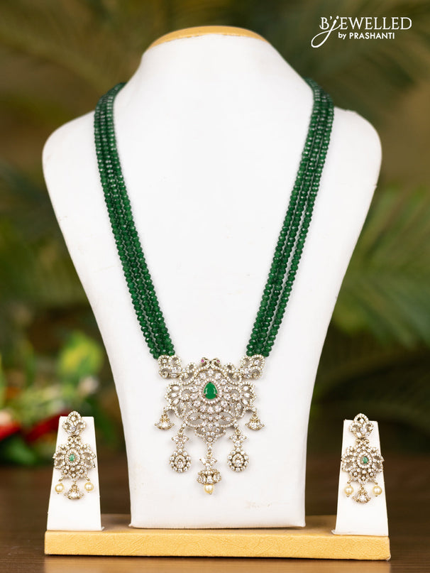 Beaded triple layer dark green necklace with floral pendant in victorian finish