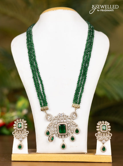 Beaded triple layer dark green necklace with double peacock pendant in victorian finish