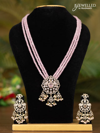 Beaded triple layer baby pink necklace with double peacock pendant in victorian finish