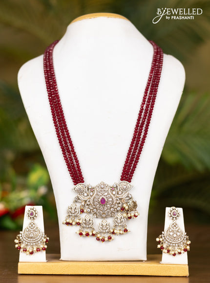 Beaded triple layer maroon necklace with floral pendant in victorian finish
