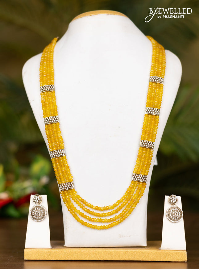 Beaded triple layer yellow necklace with floral pendant in victorian finish