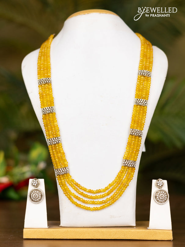Beaded triple layer yellow necklace with floral pendant in victorian finish