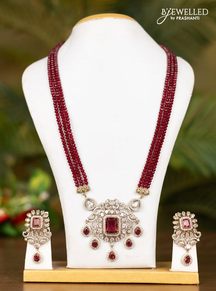 Beaded triple layer maroon necklace with double peacock pendant in victorian finish