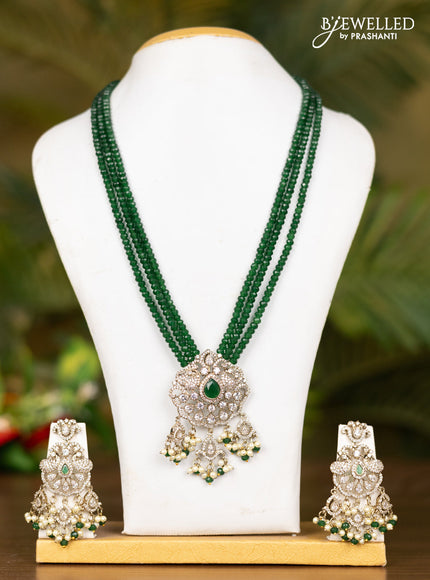 Beaded triple layer dark green necklace with double peacock pendant in victorian finish
