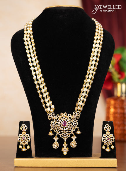 Pearl triple layer haaram with ruby & cz stones and hangings