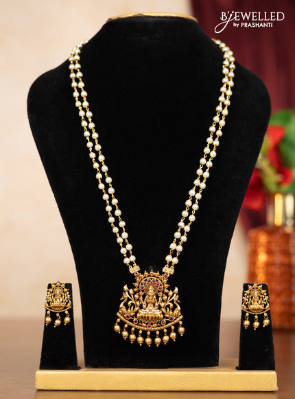 Pearl double layer haaram lakshmi pendant with ruby stones and golden beads hangings