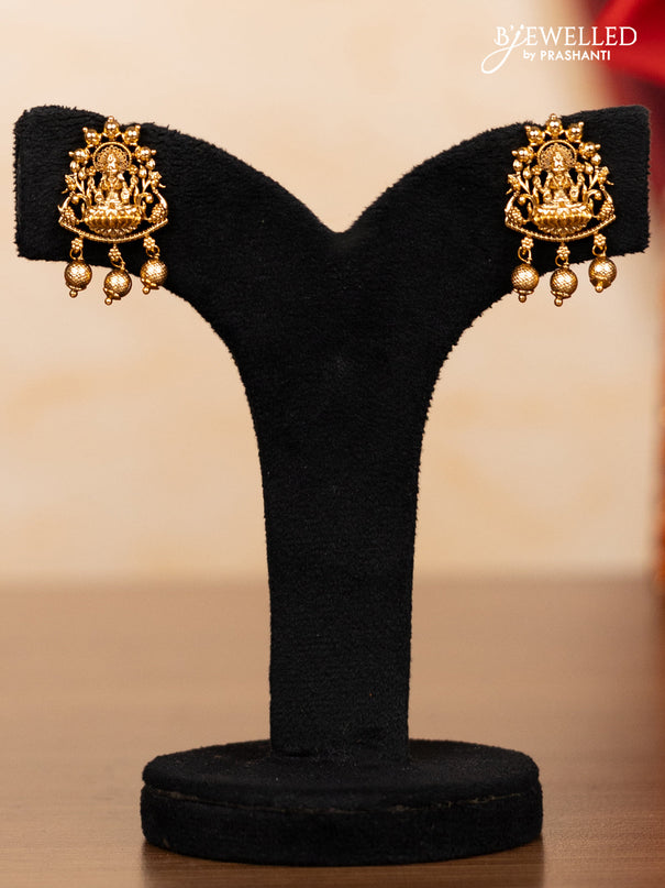 Pearl double layer haaram lakshmi pendant with ruby stones and golden beads hangings