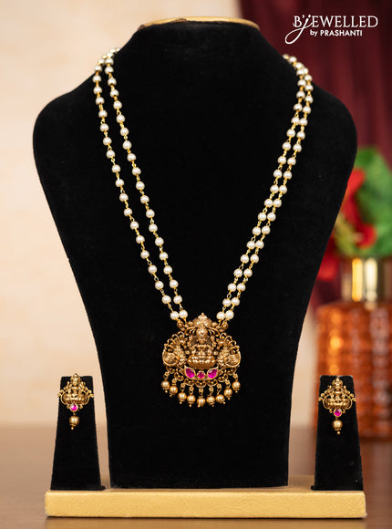 Pearl double layer haaram lakshmi pendant with pink jadau stones and golden beads hangings