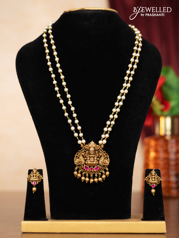 Pearl double layer haaram lakshmi pendant with pink jadau stones and golden beads hangings