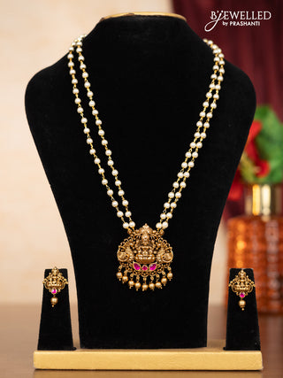 Pearl double layer haaram lakshmi pendant with pink jadau stones and golden beads hangings