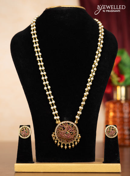 Pearl double layer haaram peacock design with kemp & cz stones and golden beads hangings