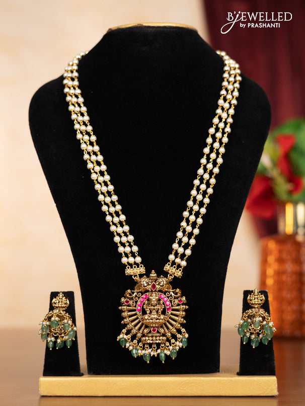 Pearl triple layer haaram lakshmi pendant with pink jadau stones and mint green beads hangings