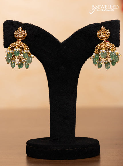Pearl triple layer haaram lakshmi pendant with pink jadau stones and mint green beads hangings
