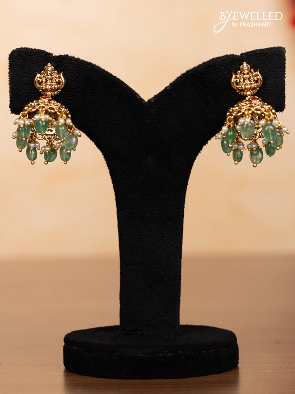 Pearl triple layer haaram lakshmi pendant with pink jadau stones and mint green beads hangings