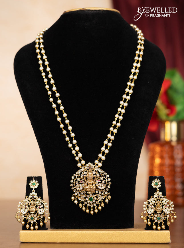 Pearl double layer haaram lakshmi pendant with kemp & cz stones and golden beads hangings