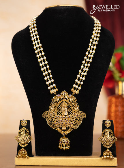 Pearl triple layer haaram radha krishna pendant with ruby stones and golden beads hangings