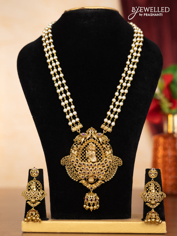 Pearl triple layer haaram radha krishna pendant with ruby stones and golden beads hangings