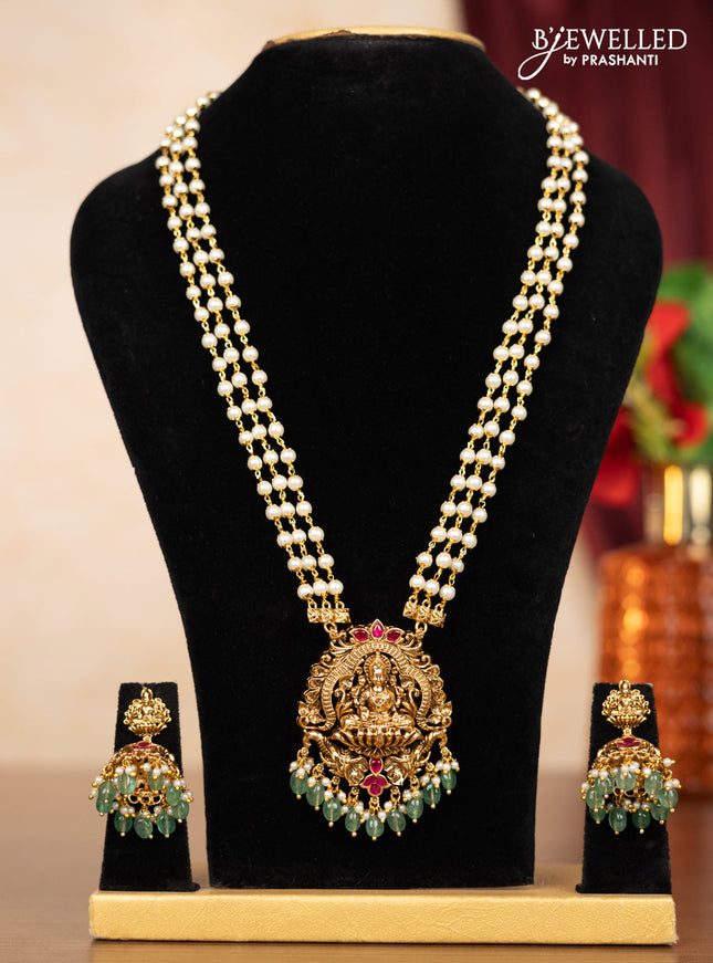 Pearl triple layer haaram lakshmi pendant with pink jadau stones and mint green beads hangings