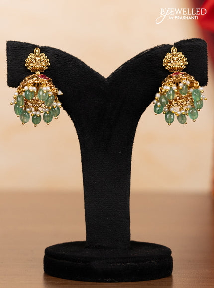 Pearl triple layer haaram lakshmi pendant with pink jadau stones and mint green beads hangings