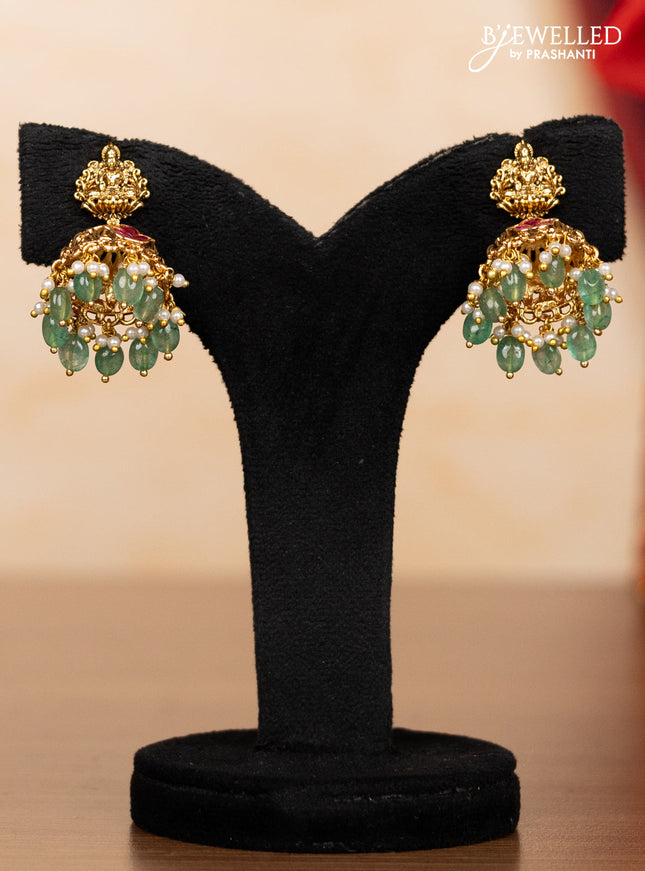 Pearl triple layer haaram lakshmi pendant with pink jadau stones and mint green beads hangings