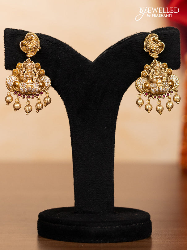Pearl double layer haaram lakshmi pendant with ruby & cz stones and golden beads hangings